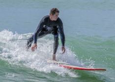 Surfer at Cobden Beach